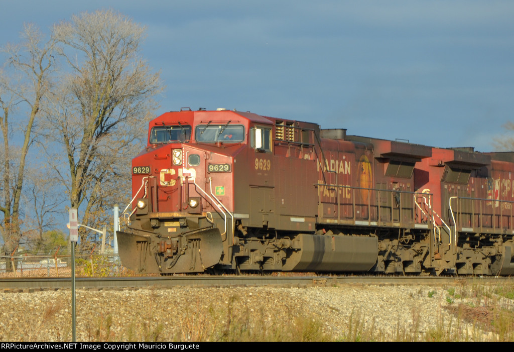 CP AC44CW Locomotive leading a train